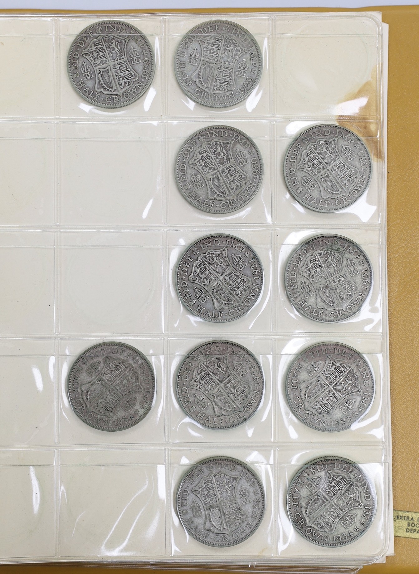 Two albums of UK coins, George III to George VI to include 1921 to 1946 halfcrowns, 1807 penny VF, 1805 Irish halfpenny AVF, a 'Revolution Jubilee 1788' medal etc